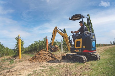 New Holland E15X compact excavator diggin in dirt
